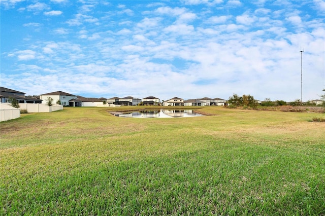 view of yard with a water view