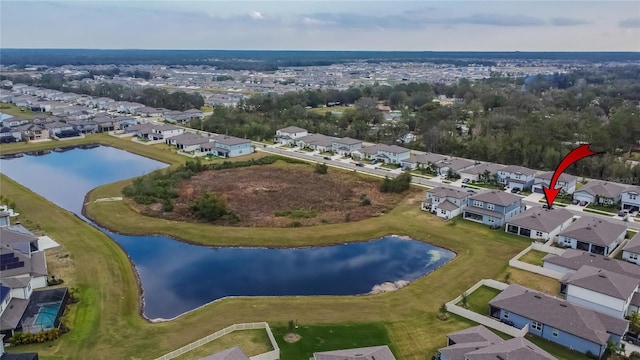 drone / aerial view with a water view