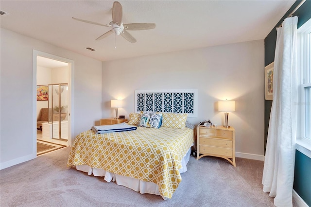 12940 Brookside Moss Dr, Riverview, FL 33579 - carpeted bedroom with baseboards, ensuite bath, and ceiling fan
