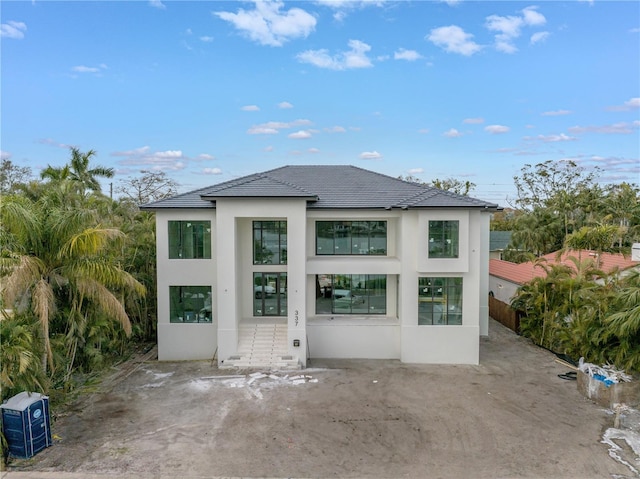 back of property with a patio area