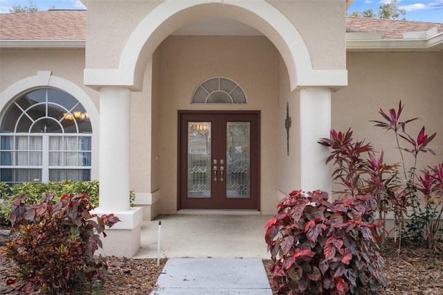 entrance to property featuring french doors