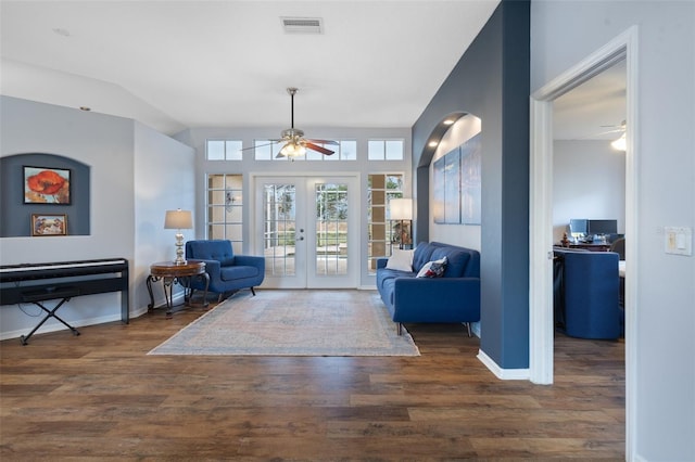 sitting room featuring french doors, dark hardwood / wood-style flooring, and ceiling fan