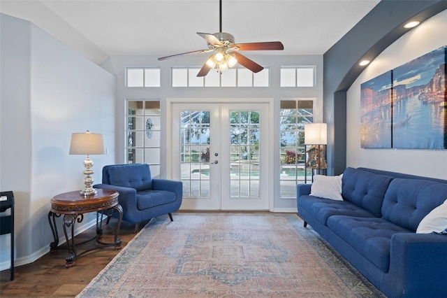 living room with ceiling fan, wood-type flooring, and french doors