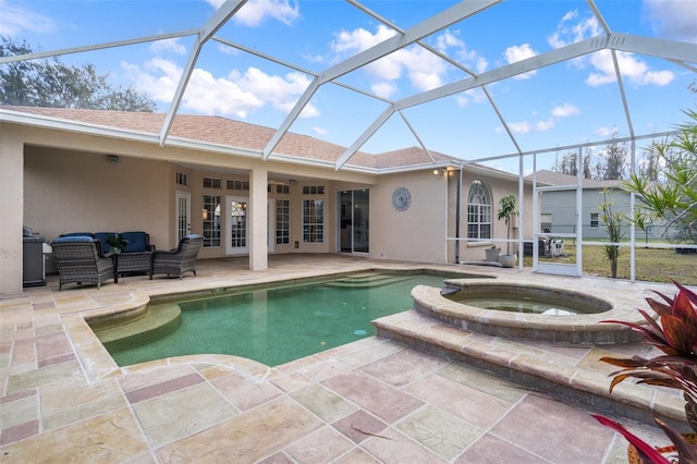 view of swimming pool with an in ground hot tub, an outdoor hangout area, a lanai, and a patio area