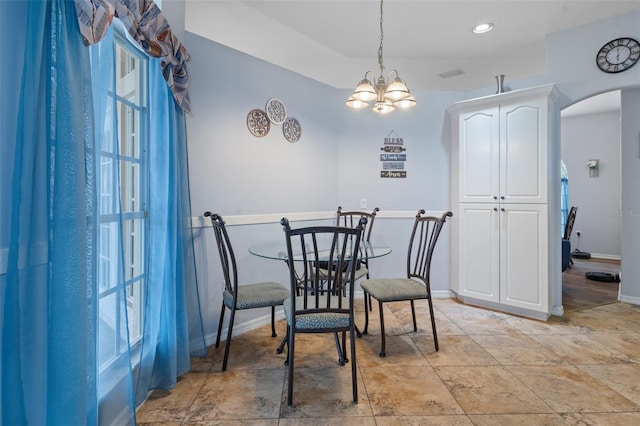 dining area with a chandelier