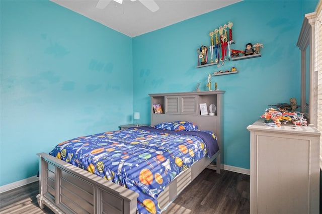 bedroom featuring ceiling fan and dark hardwood / wood-style floors