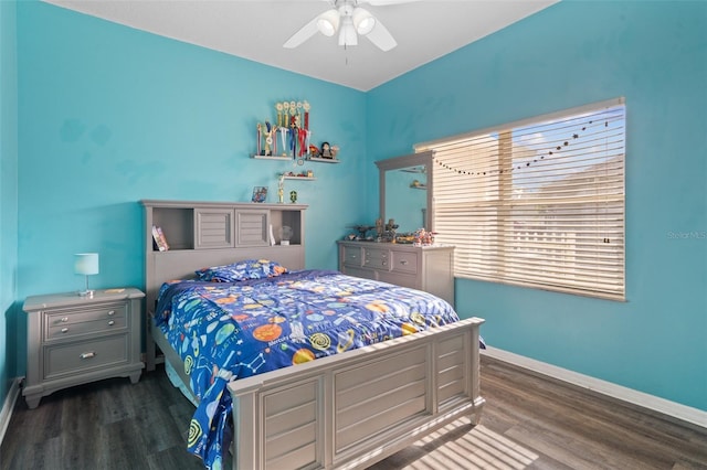 bedroom featuring dark hardwood / wood-style floors and ceiling fan