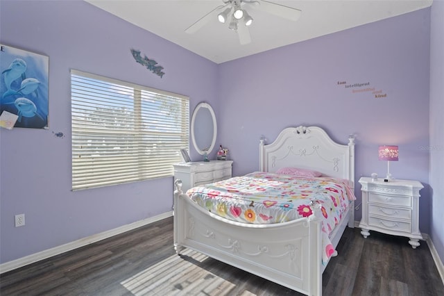 bedroom with ceiling fan and dark hardwood / wood-style floors