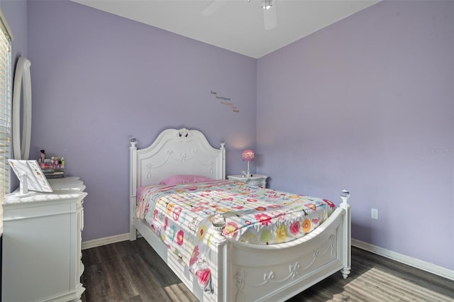 bedroom featuring ceiling fan and dark wood-type flooring