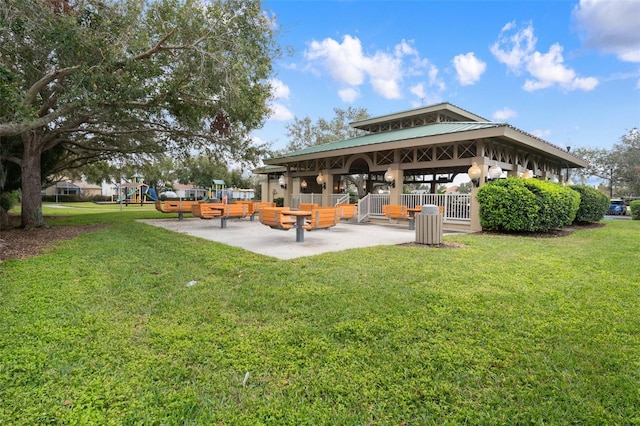 exterior space featuring a patio and a playground