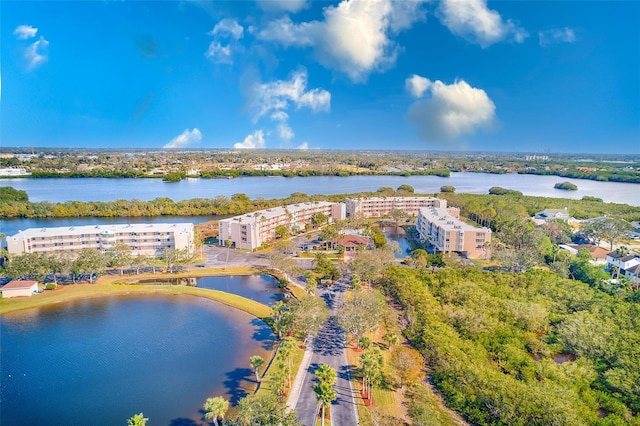 birds eye view of property featuring a water view