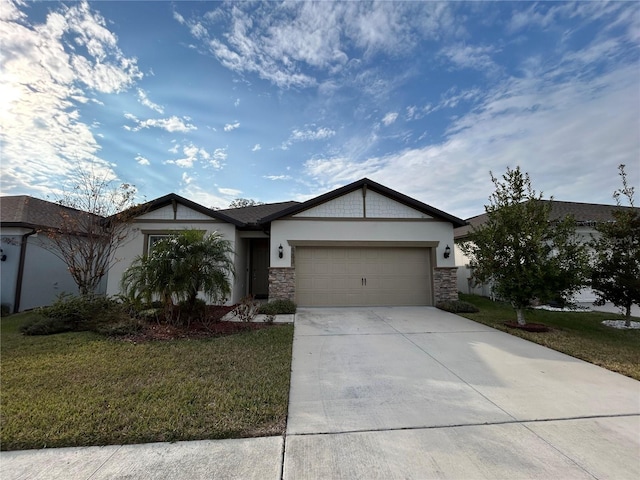 single story home with a garage and a front yard