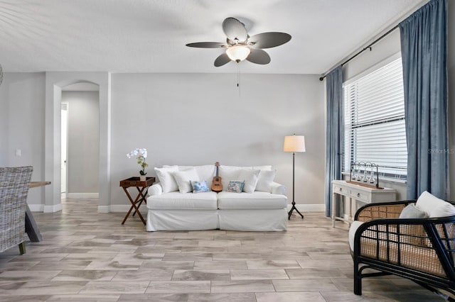 living room with ceiling fan