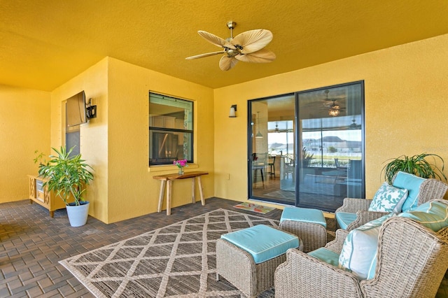 view of patio with ceiling fan