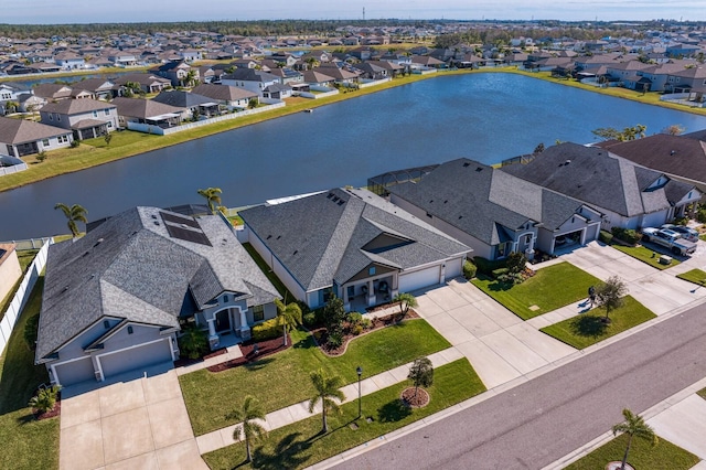 drone / aerial view featuring a water view