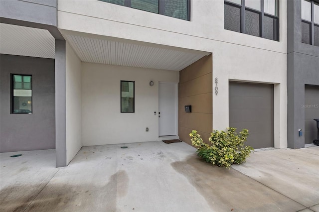 property entrance featuring a garage