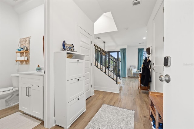 entrance foyer with light wood-type flooring