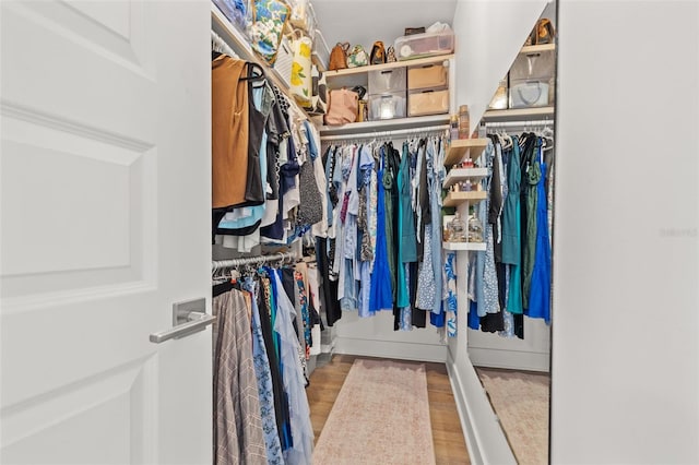 walk in closet featuring light wood-type flooring