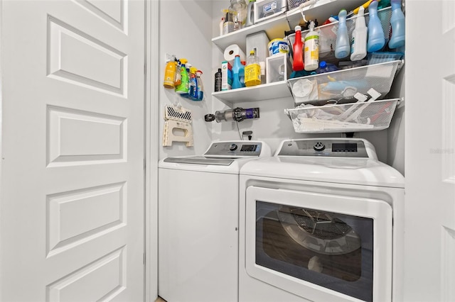 laundry area featuring washing machine and dryer