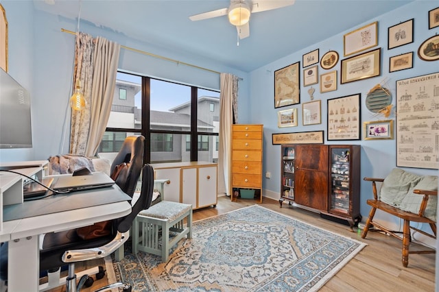 office area featuring ceiling fan and light hardwood / wood-style flooring