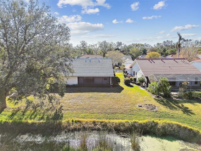 drone / aerial view featuring a water view