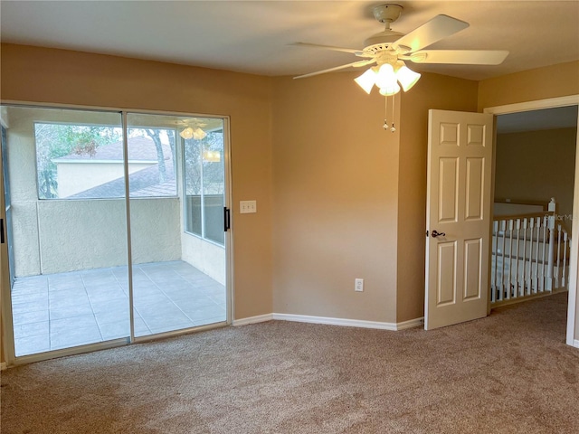 unfurnished room with ceiling fan and light colored carpet