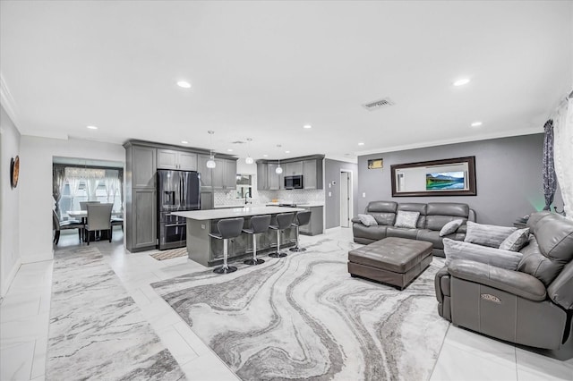 living room with crown molding