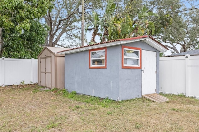 view of outdoor structure with a yard