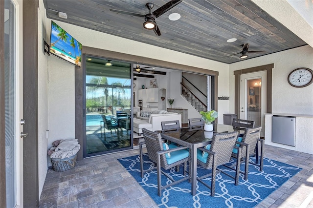 view of patio / terrace with ceiling fan