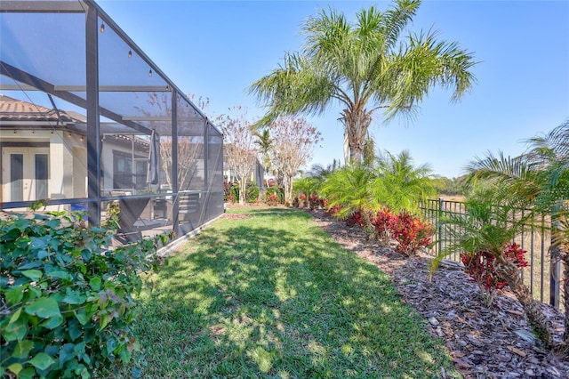 view of yard with a lanai