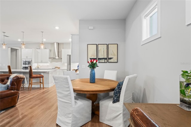 dining area featuring light hardwood / wood-style floors