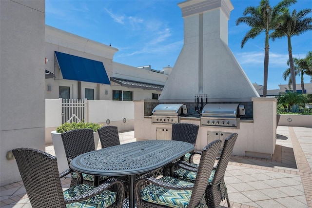 view of patio / terrace featuring an outdoor kitchen and grilling area