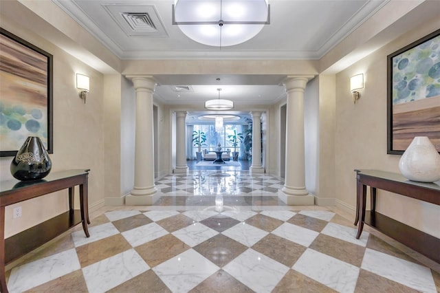 hallway featuring ornate columns and crown molding