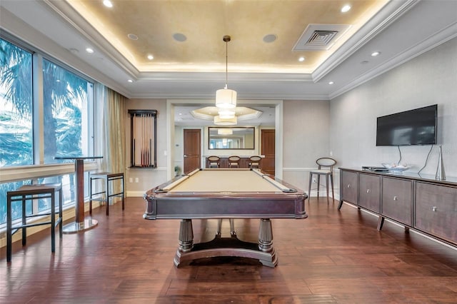 recreation room featuring a tray ceiling, crown molding, dark hardwood / wood-style flooring, and pool table