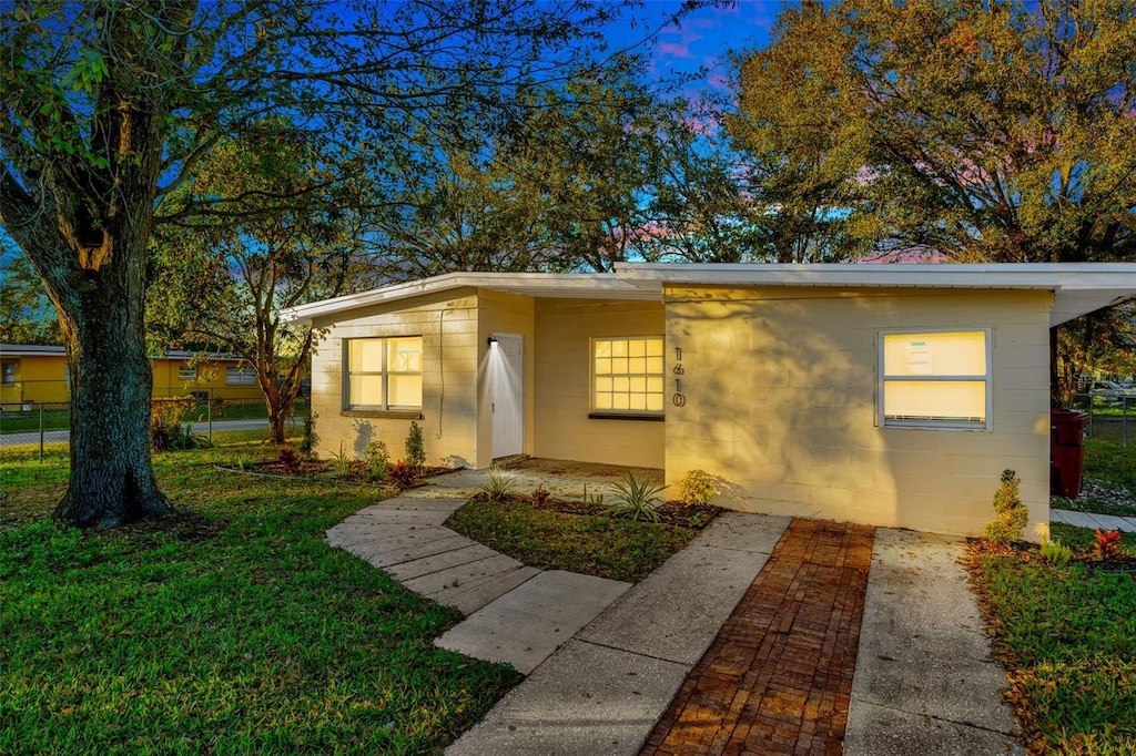 view of front of house with a front yard