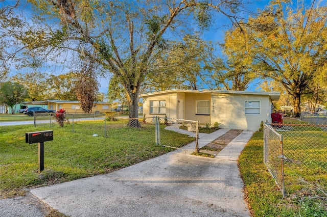 view of front of home with a front yard