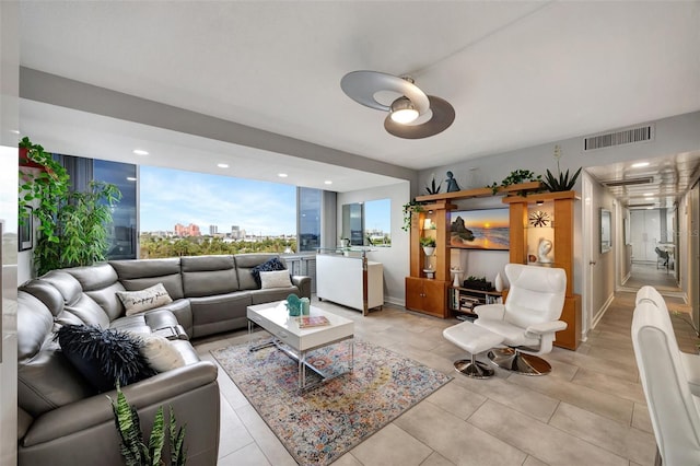 living room with ceiling fan