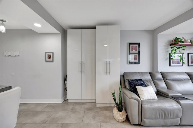 living room with light tile patterned floors