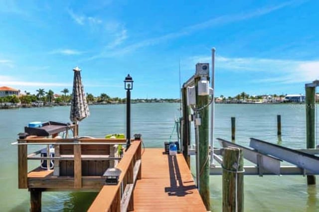 view of dock with a water view