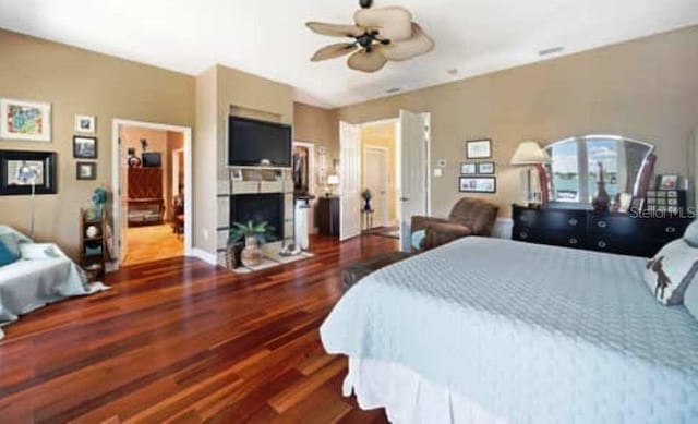 bedroom featuring ceiling fan and wood-type flooring