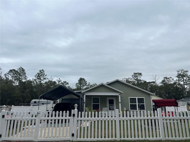 view of front of property with a carport