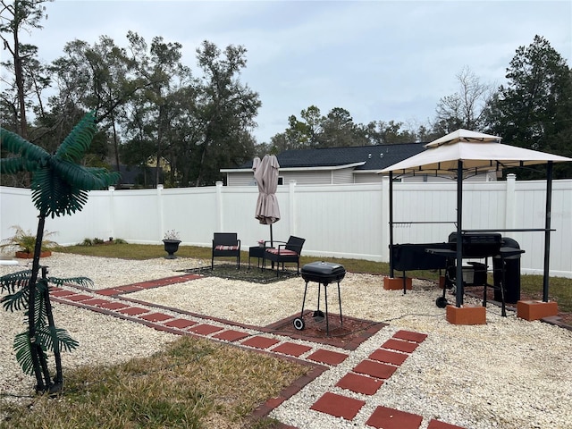 view of yard with a gazebo and a patio area