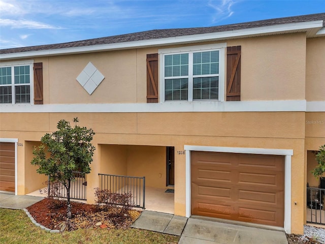 view of property with a garage