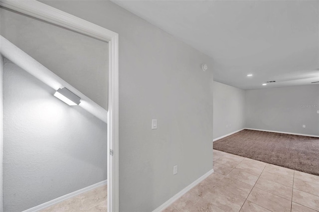 empty room featuring light tile patterned floors