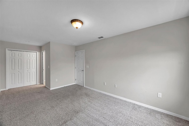 unfurnished bedroom featuring carpet floors