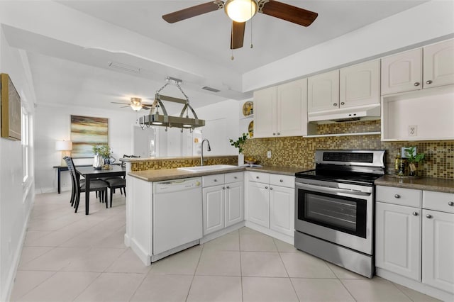 kitchen with sink, white cabinets, electric range, white dishwasher, and kitchen peninsula