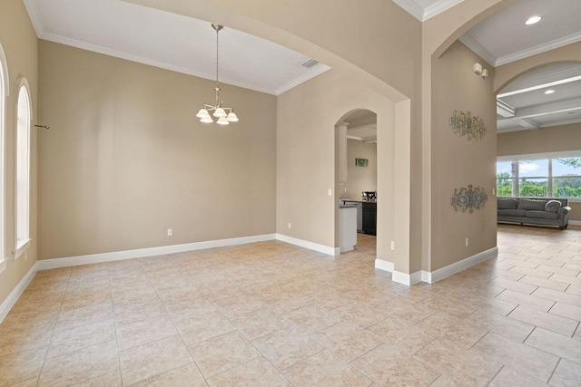 spare room featuring a chandelier, beam ceiling, ornamental molding, light tile patterned flooring, and coffered ceiling