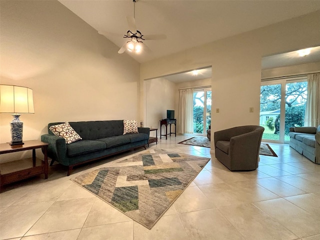 tiled living room with vaulted ceiling and ceiling fan