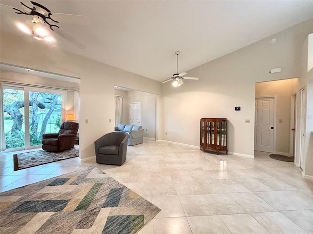 tiled living room featuring high vaulted ceiling and ceiling fan