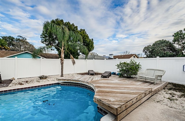 view of pool with a deck